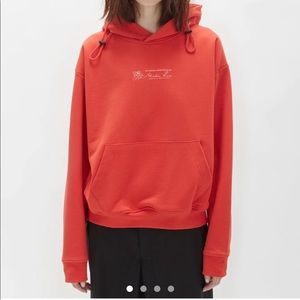 Martine Rose double drawstring hoodie in red in size XS